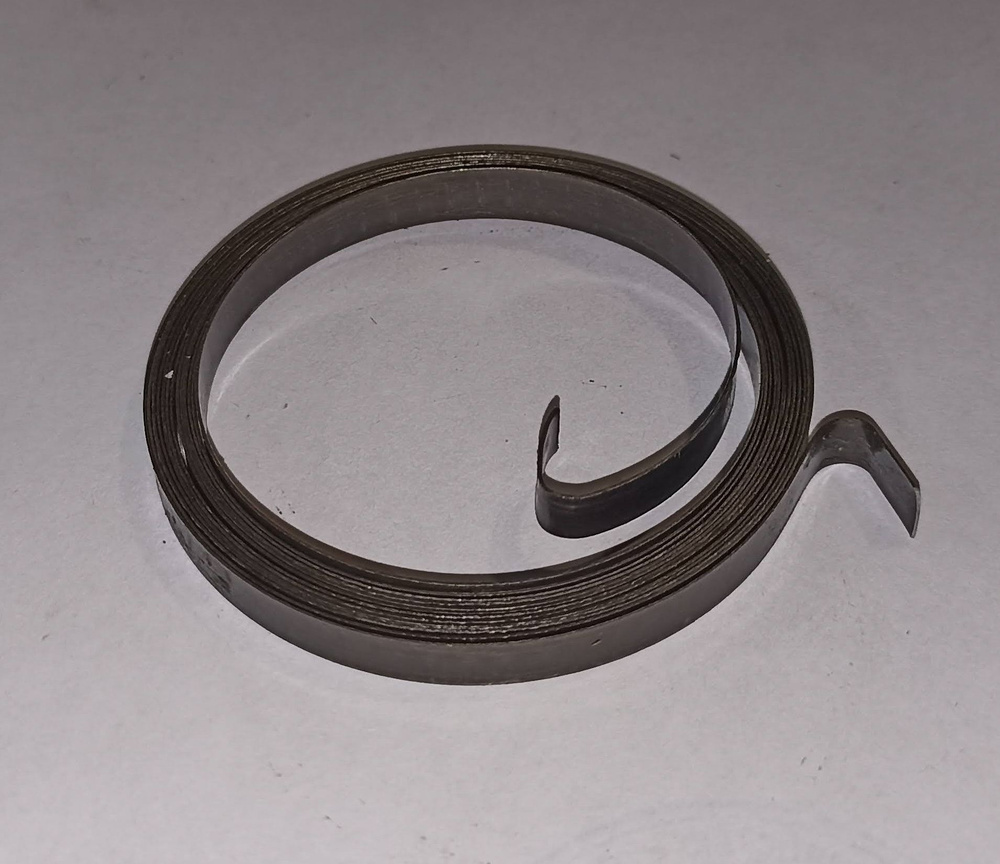 Пружина спиральная (ленточная) d-0,3 мм; H-5,0 мм; L-1000 мм; D-65 мм (1 шт.)  #1
