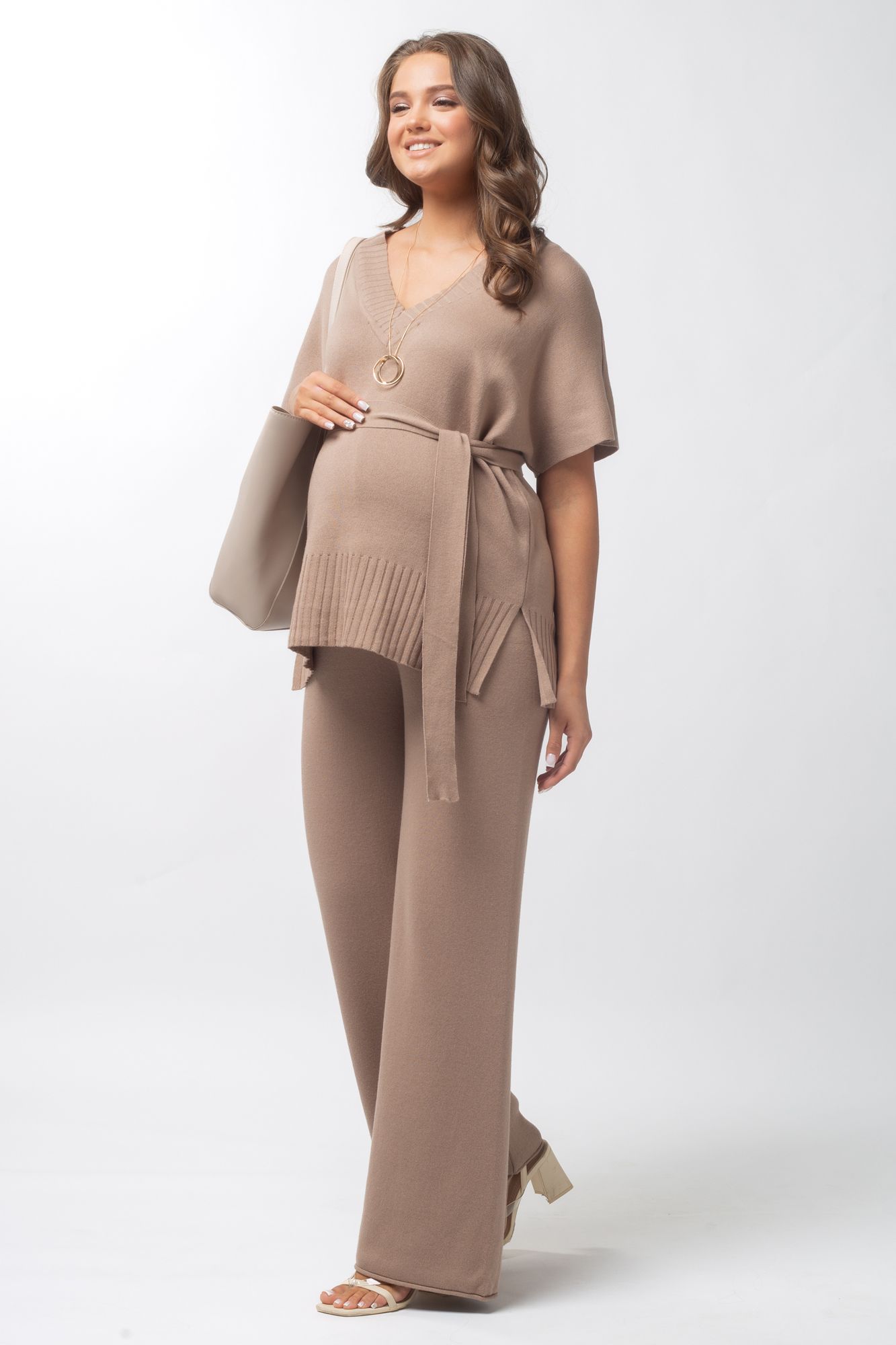 Дутое пальто для беременных