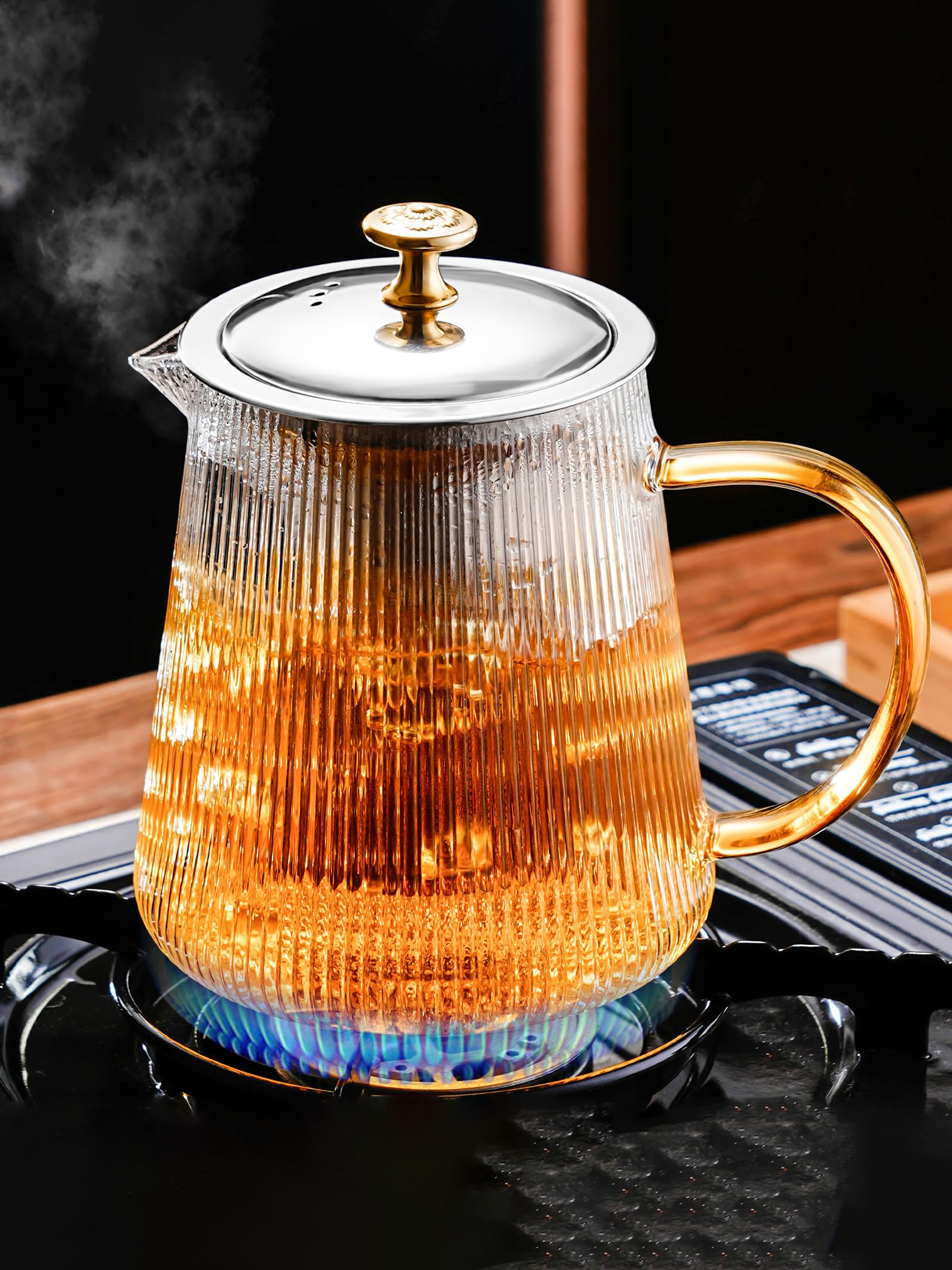 Стеклянныйзаварочныйчайниксситечком,подходящийдлячаепитияигостиной