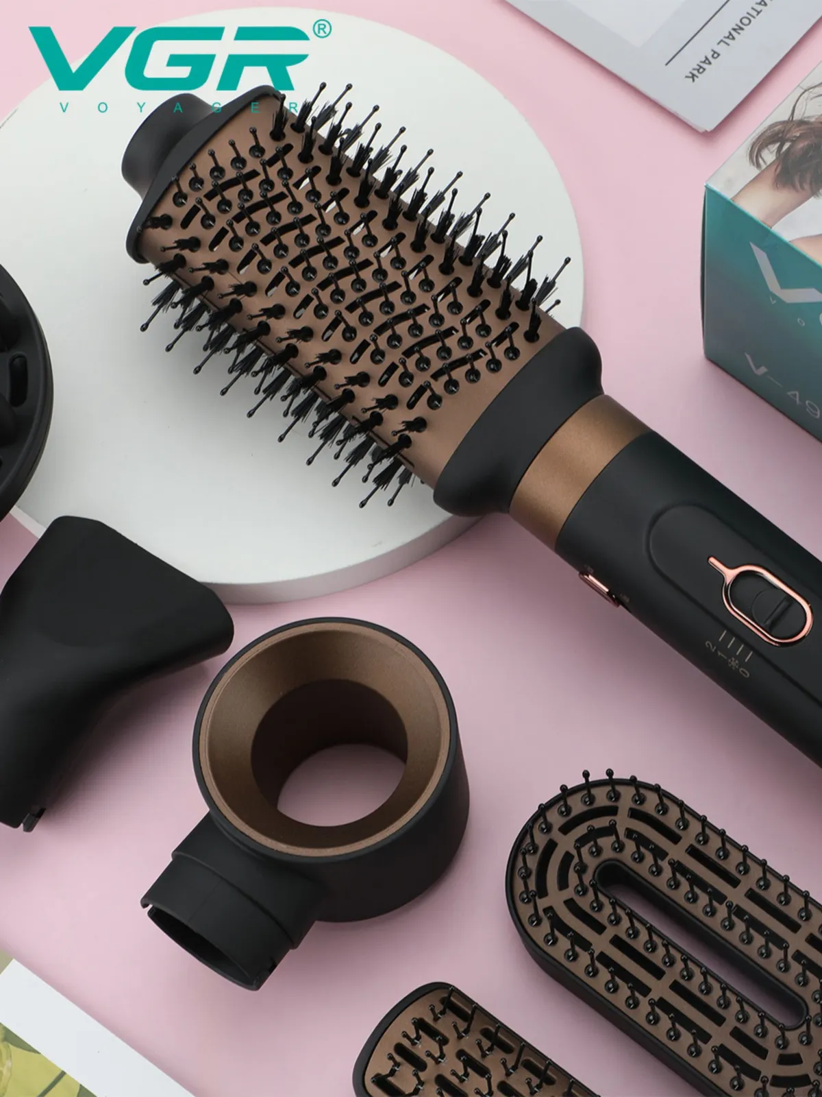 Мощный профессиональный фен для волос с функцией ионизации и 6 сменными насадками - узким концентратором, диффузором, узкой щеткой, плоской щеткой, эллипсной щеткой, феном - поможет вам бережно и быстро сушить волосы и создавать красивые прически и укладки дома, экономя время и средства на посещении парикмахерской или салона красоты. Диффузор идеален для создания естественных волн и шикарного прикорневого объема, а насадка - концентратор незаменима для получения эффекта прямых и гладких прядей или накручивания волос на круглую расческу - брашинг во время сушки и получения мягких локонов. 2 температурных режима, а также поток холодного воздуха для фиксации укладки и 2 уровня скорости воздушного потока помогут подстроить прибор под ваши индивидуальные потребности, а ионизатор придает здоровый блеск и избавит от статического электричества. Универсальный набор фен VGR V-491 подойдет для завивки и формирования кудряшек, разглаживания вьющихся волос и ухода за пористыми волосами любого типа - коротких и длинных, тонких, густых и непослушных. Компактный размер, легкий вес, удобное сопло делают этот предмет бытовой техники простым в работе и комфортным для быстрой сушки головы и создания различных стильных причесок. Электрический фен красивого серого цвета с максимальной мощностью 1000 Вт идеально подходит для создания локонов или волнистых прядей, укладки кудрей любой густоты, выпрямления пушистых волос, а также для придания объема тонким прядям в домашних условиях. Он оснащен длинным вращающимся на 360 градусов шнуром и удобной петлей - держателем для подвешивания и компактного настенного хранения. Прибор доставляется в красивой подарочный упаковке, что делает его идеальным презентом для девушек и женщин на 14 Февраля, женский праздник 8 Марта или день рождения. Он идеален для всех типов волос, включая кудрявые. Подойдет для создания объема у корней и выпрямления. У нас есть акции и распродажи, вы можете купить наши товары в подарок или со скидкой!