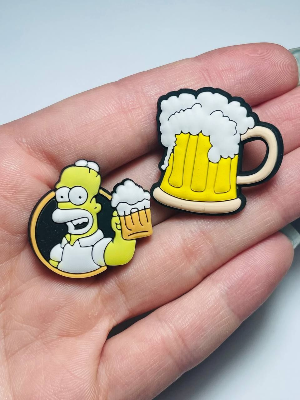 https://www.ozon.ru/product/dzhibitsy-klipsa-dlya-obuvi-gomer-simpson-i-pivo-730029074/