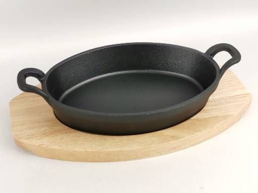 Сковорода ТМ Bonaffini чугунная 27х15см овальная на деревянной доске ...
