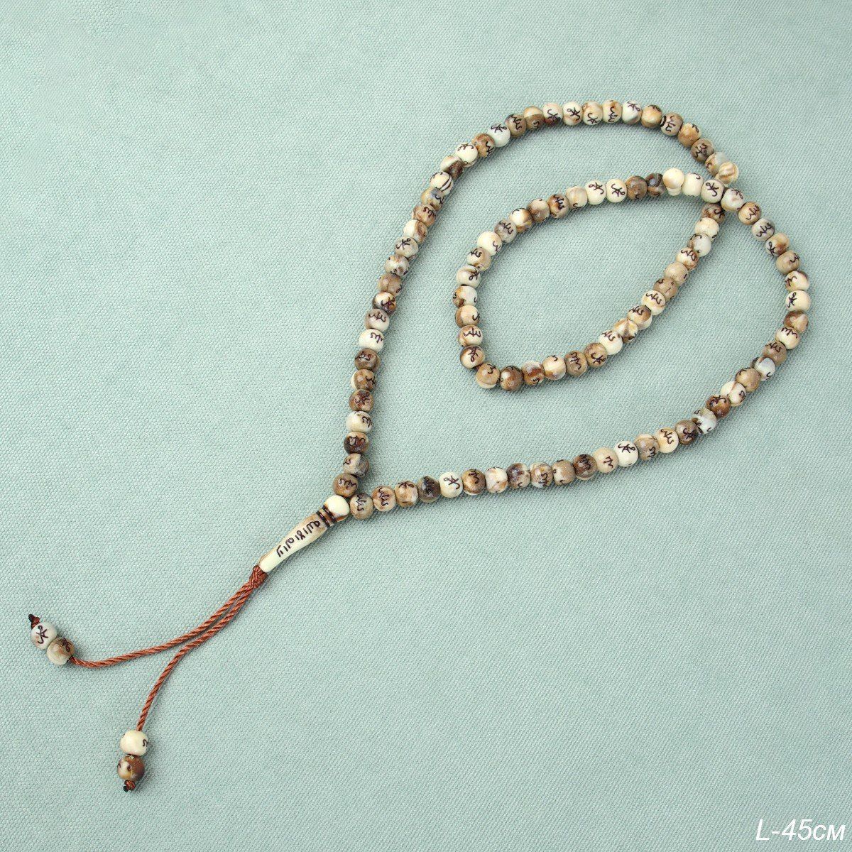 Четки мусульманские пластиковые 45 см, бежевые Четки мусульманские пластиковые 45 см, бежевые