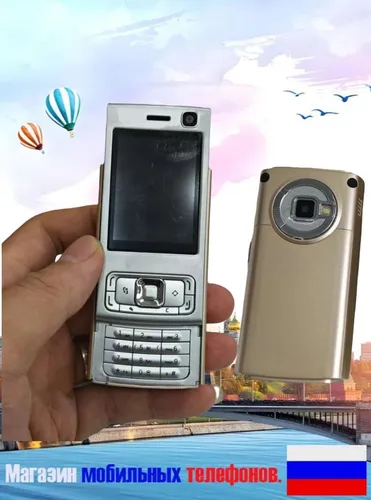 Мобильный телефон Мини-версия N95 с выдвижной крышкой и кнопкой мобильного телефона с двумя sim-карт