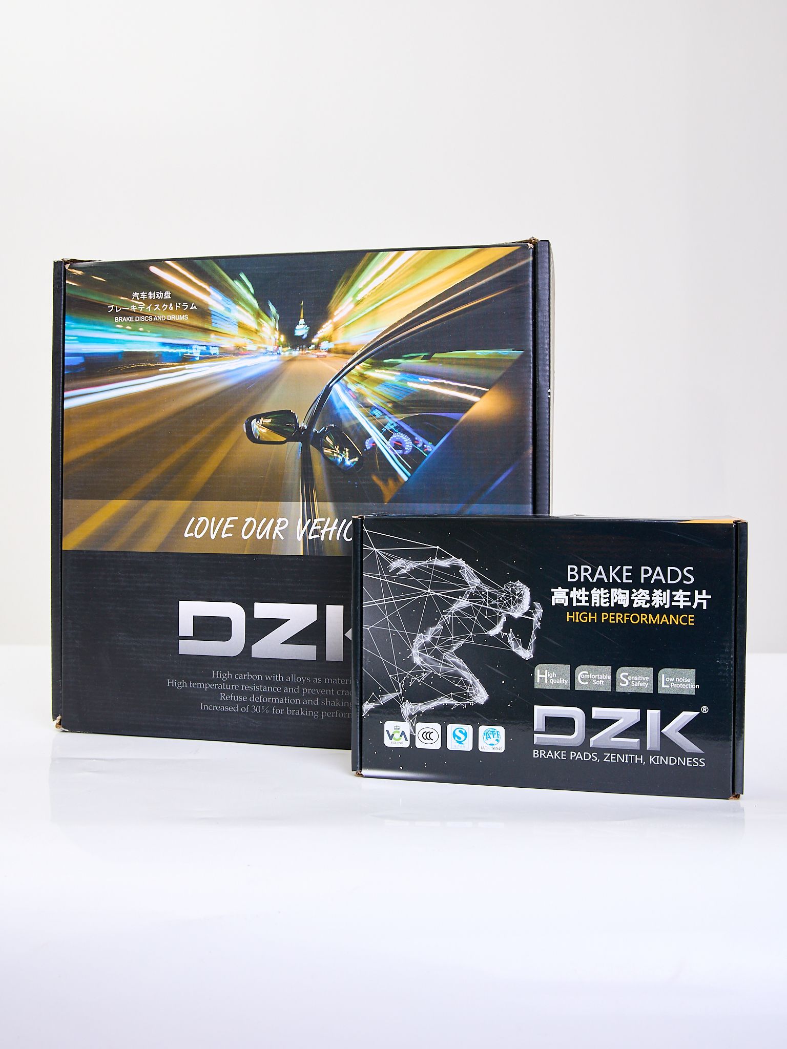 Комплект задних тормозных перфорированных дисков и колодок DZK для