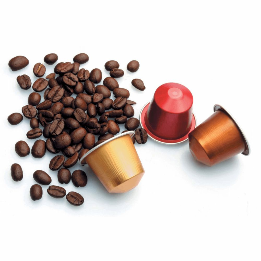 Капсульное кофе неспрессо. Капсульный кофе что это. Кофе в капсулах. Неспрессо кофе зерновой. Кофе в капсуле с крышкой.
