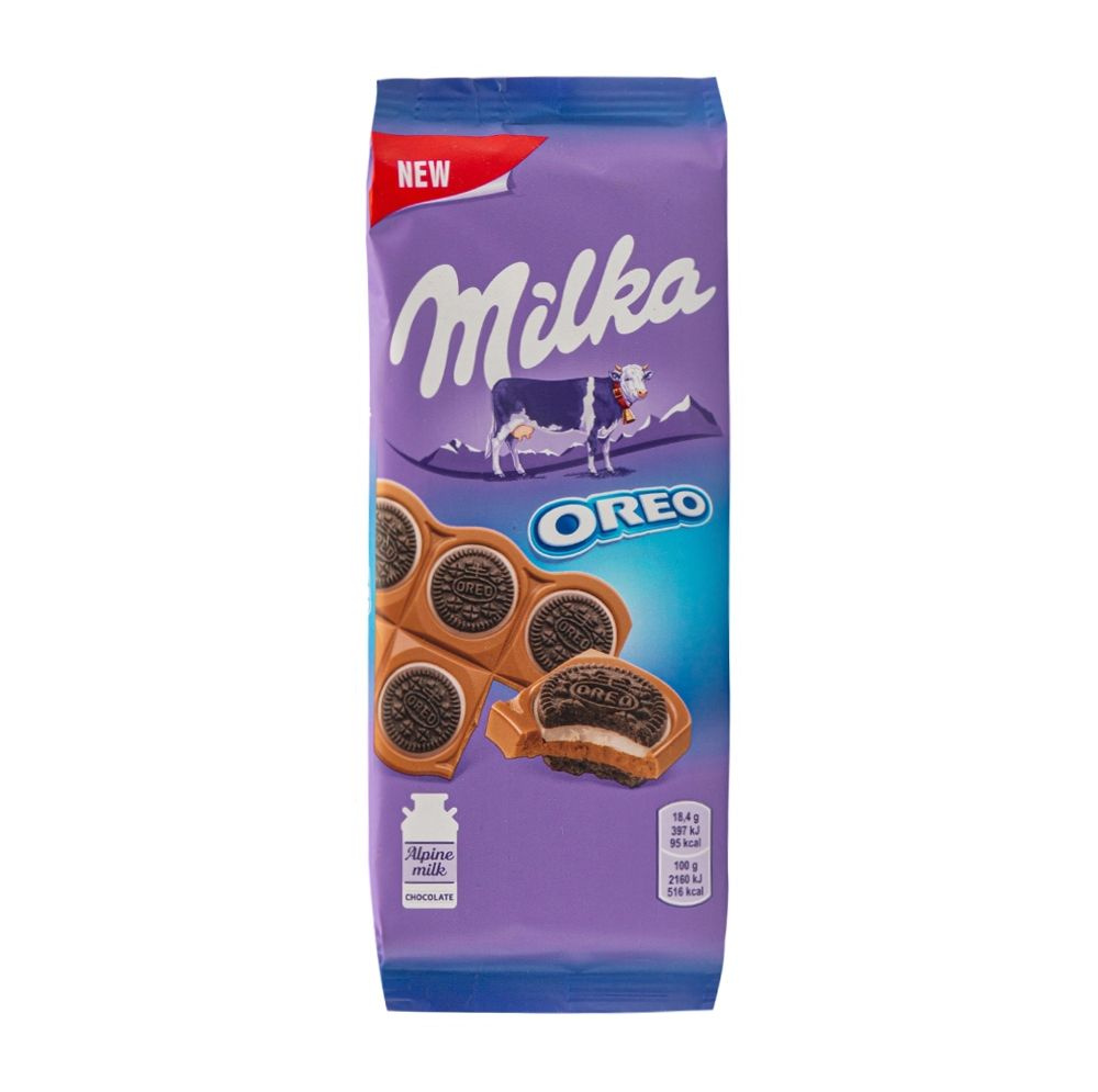 Шоколад Milka молочный с круглым печеньем Орео с начинкой со вкусом ...