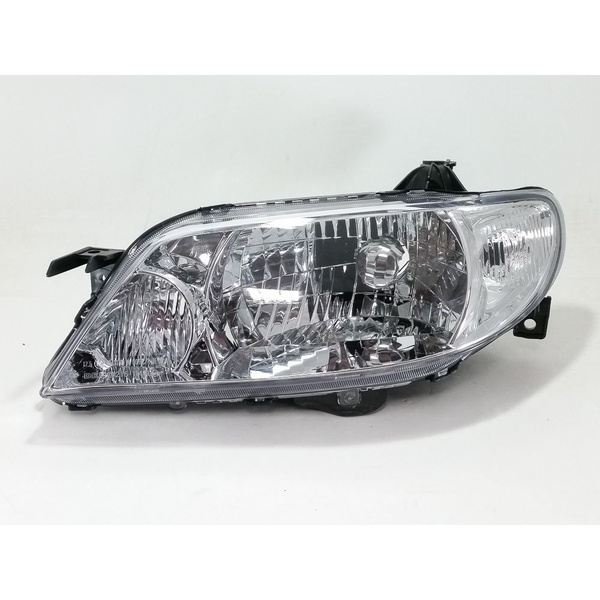 Фара Mazda 323 00-03 / Familia 00-03 (Слева/ Галоген/ Ручная регулировка)