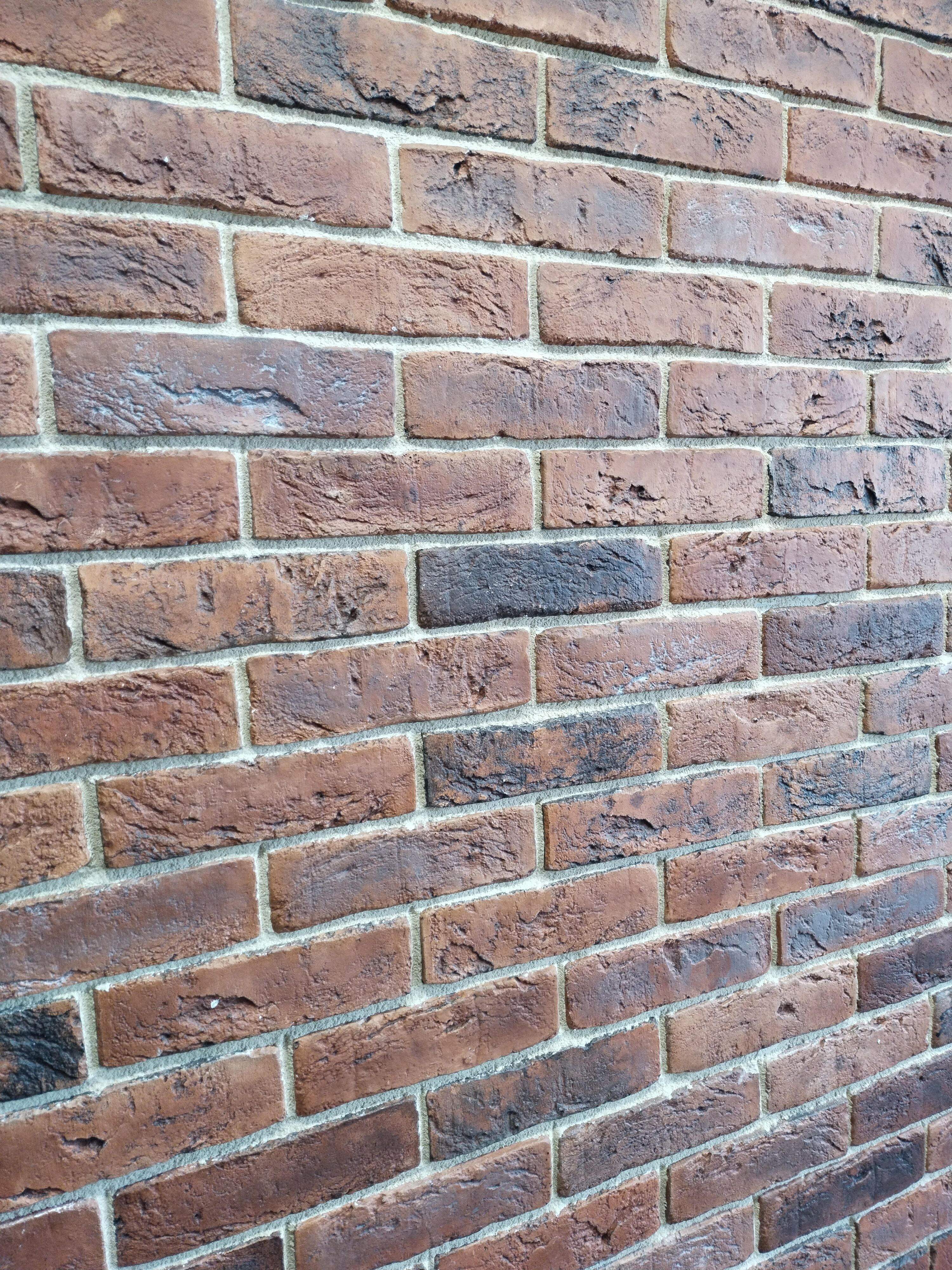 Укладка плитки под кирпич одной стены