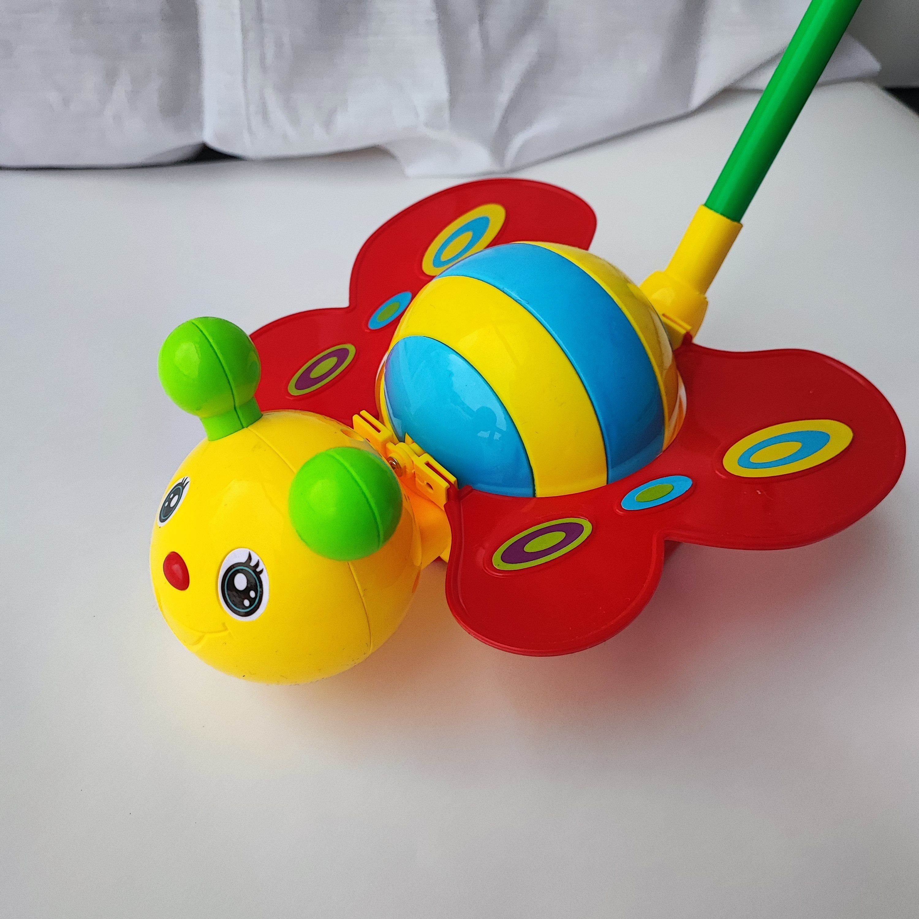 Игрушка каталка для малышей Бабочка Пчелка - купить с доставкой по ...