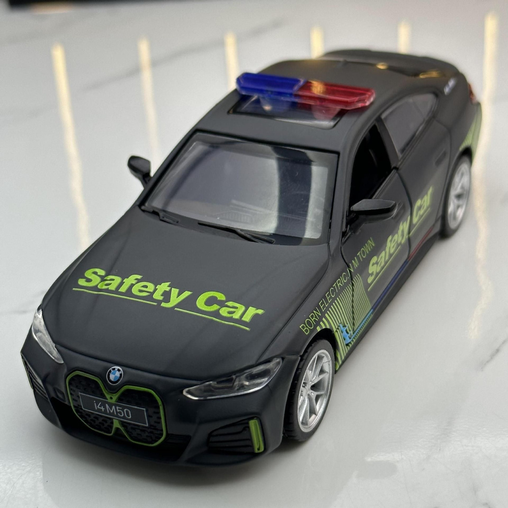 Машинка металлическая BMW i4 Safety Car черный матовый, масштаб 1:34, длина  15 см., свет и звук, открываются двери, капот и багажник - купить с  доставкой по выгодным ценам в интернет-магазине OZON (1189883143)