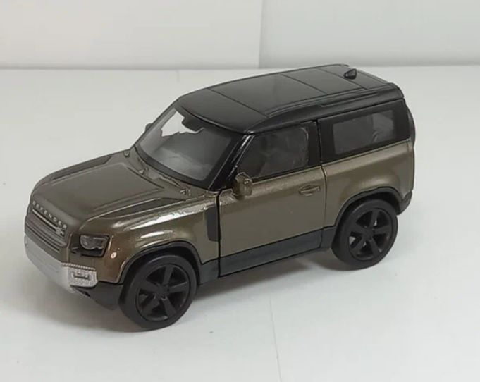 Игрушка Welly Машинка 1:38 Land Rover Defender 2020, пруж. мех., коричневый металлик  #1