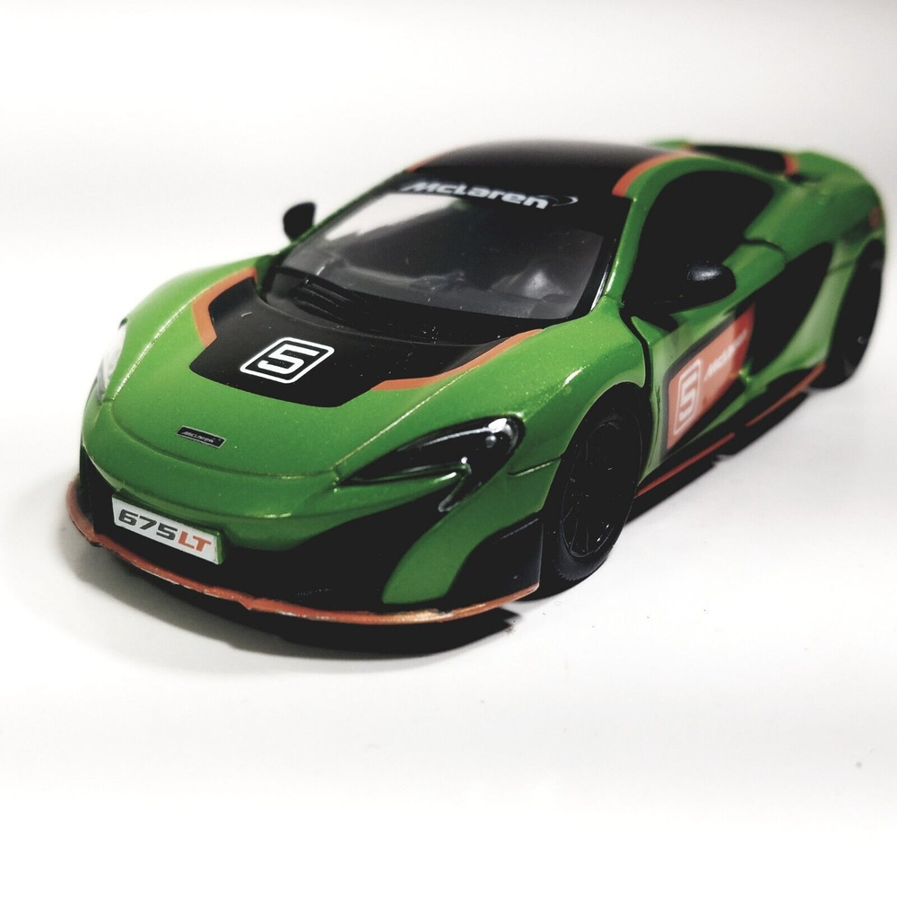 Машинка металлическая Макларен Kinsmart 1:36 McLaren 675LT 5392DFKT  инерционная, цвет Зелено-черный с принтом - купить с доставкой по выгодным  ценам в интернет-магазине OZON (538548144)