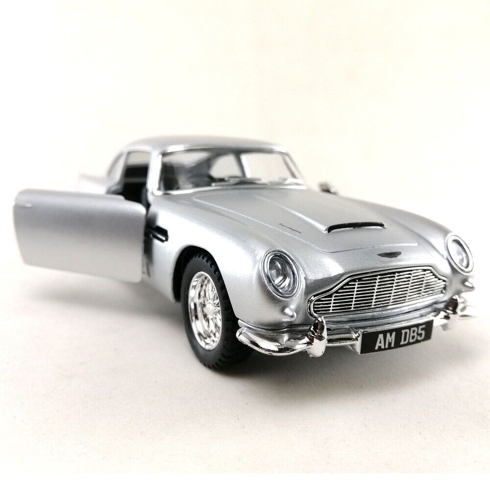 Машинка металлическая Астон Мартин ДБ5 Джеймс Бонд Aston Martin DB5  Kinsmart 1:38 5406DKT инерционная, цвет Серебристый - купить с доставкой по  выгодным ценам в интернет-магазине OZON (534930859)