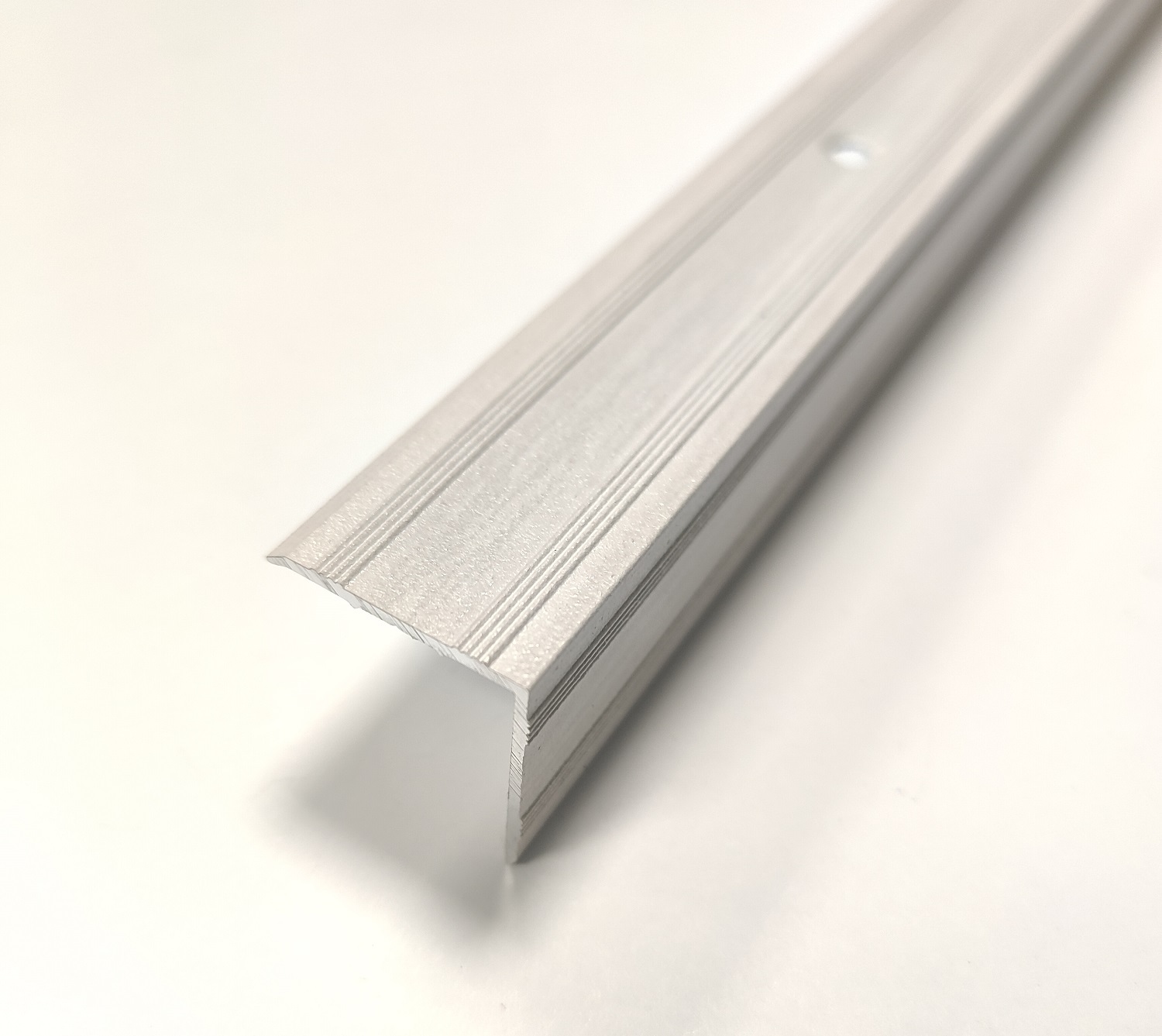 Порожекдлянапольныхпокрытийугловой21х21мм,длина1,8м,Русскийпрофиль,Угол21*211,8Ясеньсерый