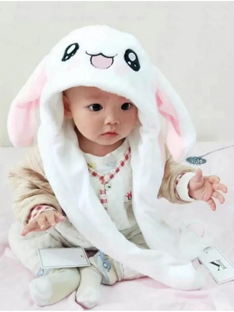 шапка с кроличьими ушами. шапка с подвижными ушками зайка. шапка заяц с двигающимися ушами светящиеся. шапка зайка светящаяся с подвижными ушками. шапочка с заячьими ушками.