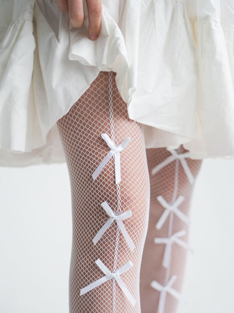 Фотокөрмеде колготки киген