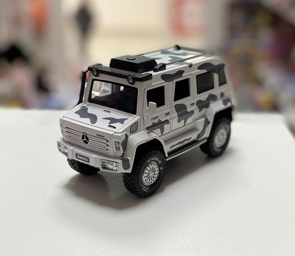 Машинка металлическая игрушка 1:24 Mercedes-Benz Unimog U 5000 18 см #1