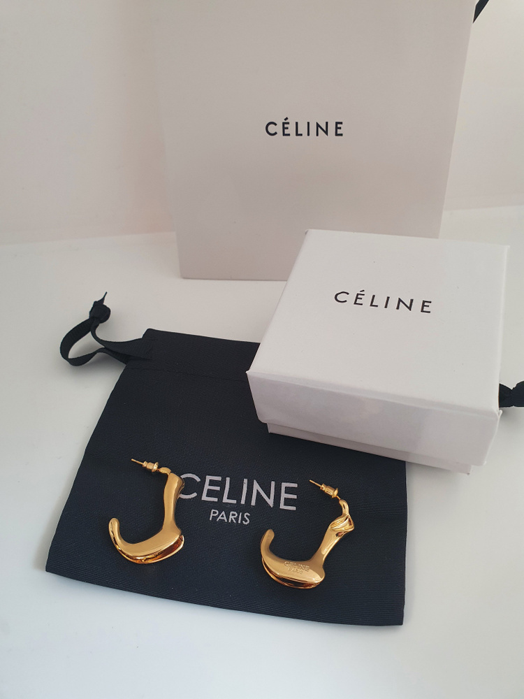 Серьги в стиле CELINE в виде сапожка под золото клеймо CELINE в ...