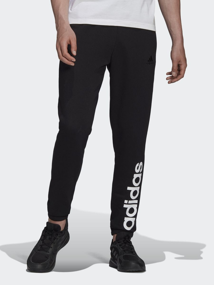 Брюки спортивные adidas Sportswear Essentials Fleece Tapered Joggers #1