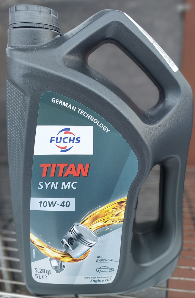 Titan formula 5w-40. Titan 10w40. Titan 10w40. Моторное масло фукс 10w 40. Titan syn mc 10w-40.
