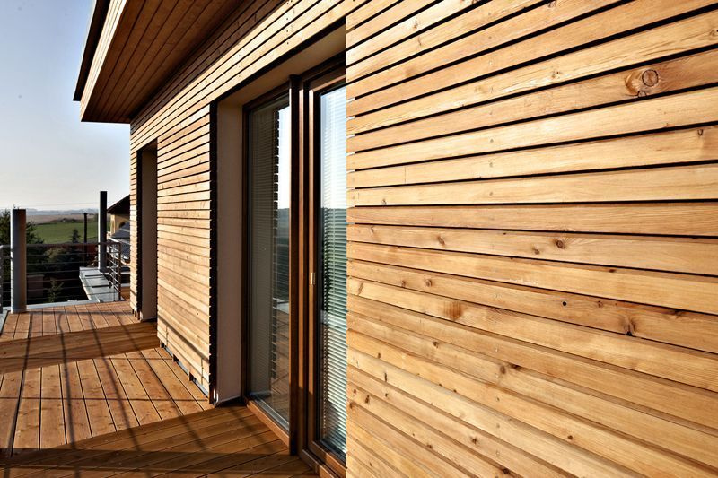 фиброцементный сайдинг под дерево крупным планом