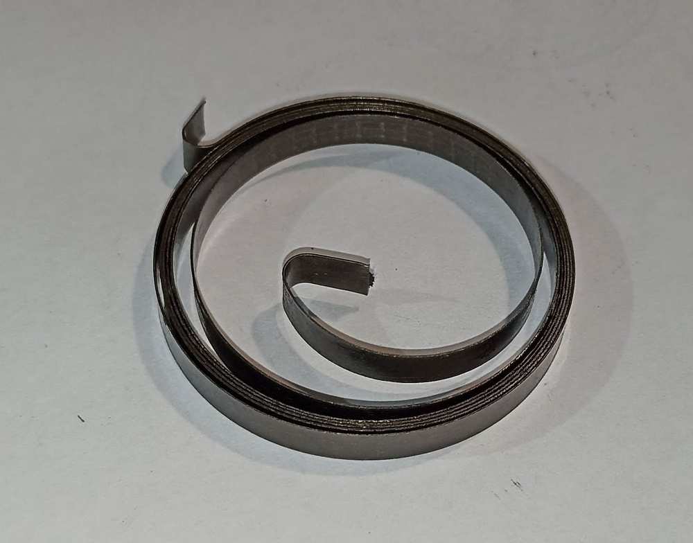 Пружина спиральная (ленточная) d-0,3 мм; H-5,0 мм; L-1000 мм; D-45 мм (1 шт.)  #1
