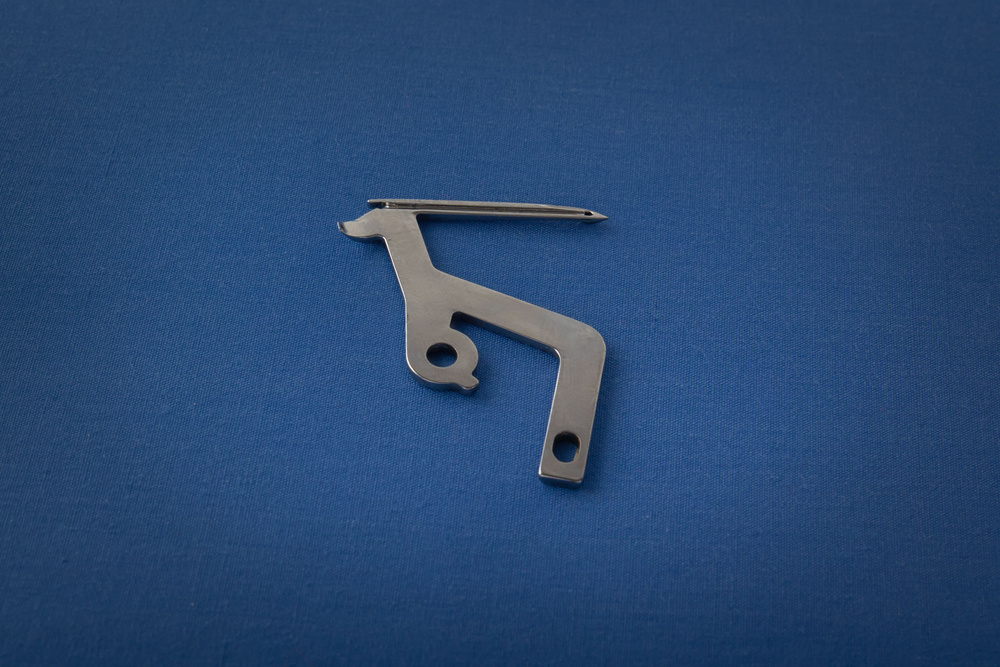 Петлитель нижний, левый MerryLock 007, 011, 5000, 5550 - купить с ...