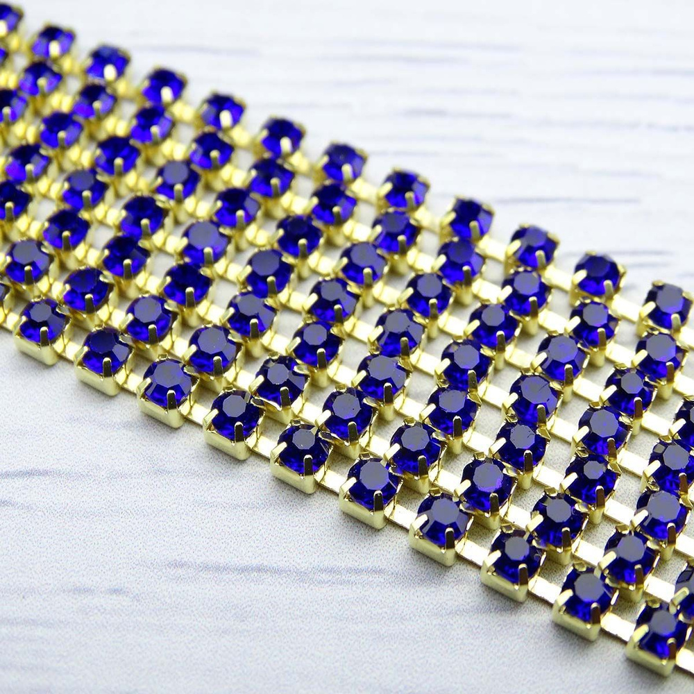 Цепочка из страз в цапах под золото, 3 мм*30 см, цвет сапфир, Astra ...