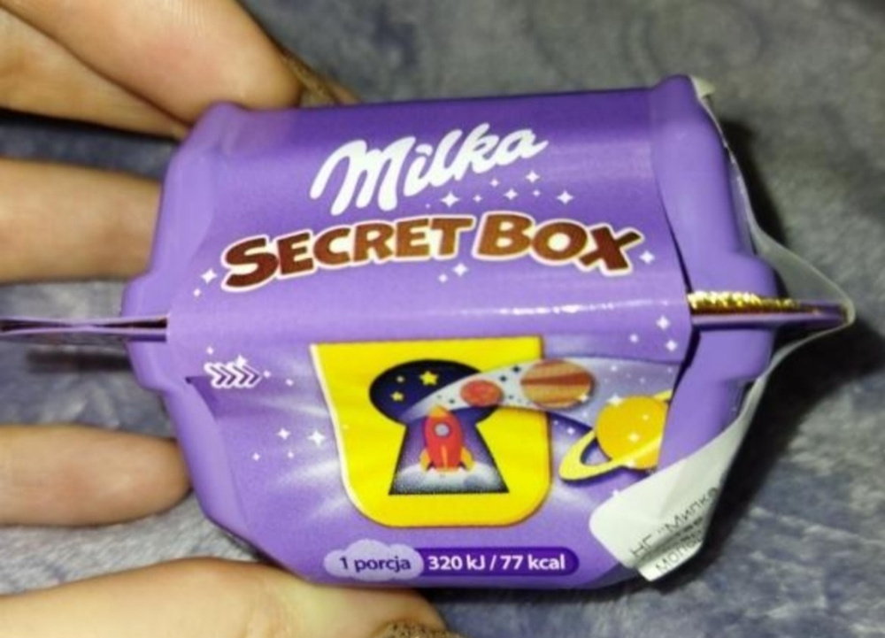 Secret box. Milka Secret Box. Милка секрет бокс конфеты. Milka Secret Box игрушки. Конфеты с игрушкой Milka Secret Box.