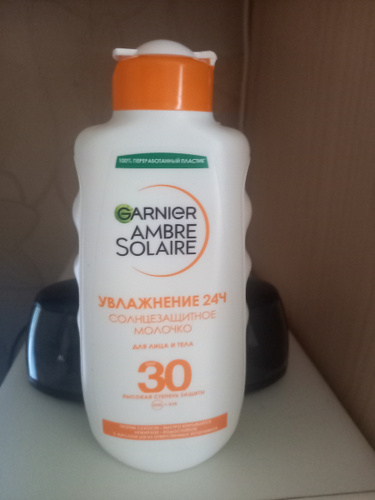 GARNIER Солнцезащитное молочко для лица и тела Ambre Solaire, с карите ...