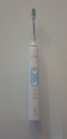 Philips Sonicare Электрическая зубная щетка HX6859/29, белый, синий #40, Евгений