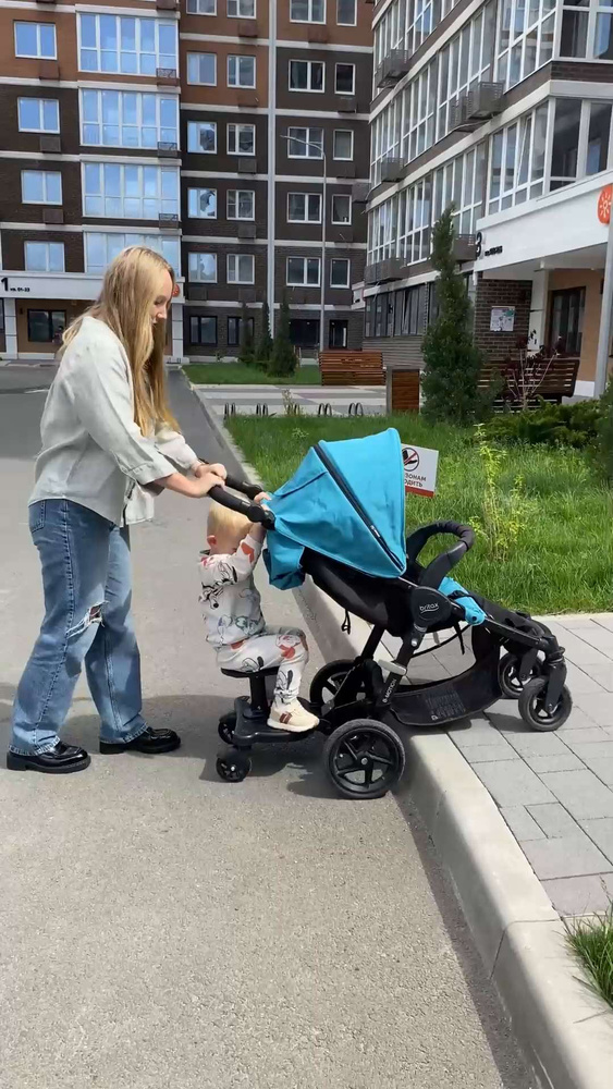 Простые решения: подножка на коляску для второго ребенка